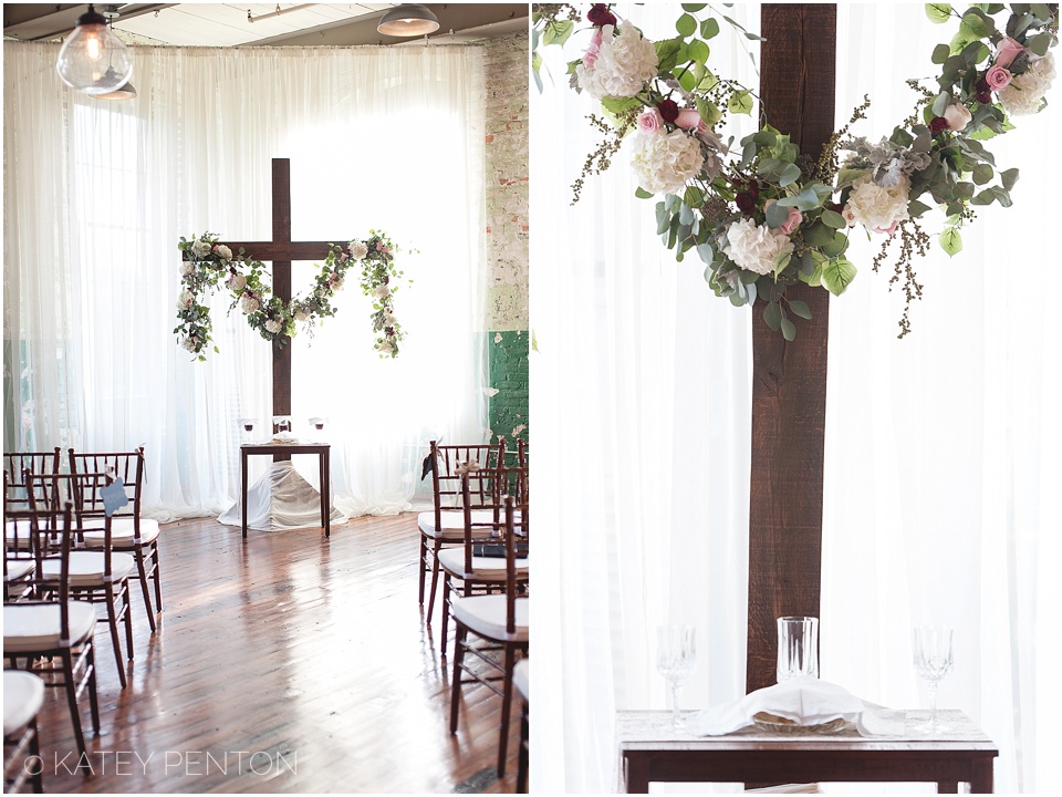 Engine room wedding ceremony, Monroe Ga Wedding, floral drape ceremony backdrop, cross ceremony backdrop 