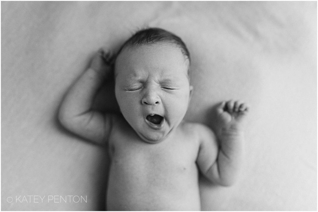 Black and white newborn baby yawning portraits, Athens GA newborn lifestyle portrait session